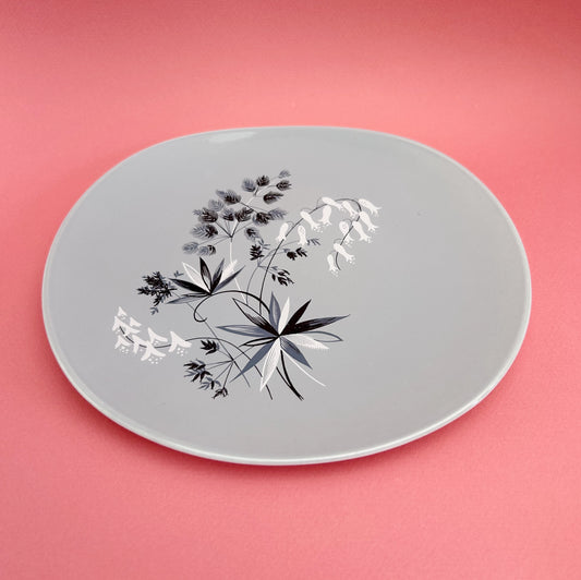 Set of four grey side plates